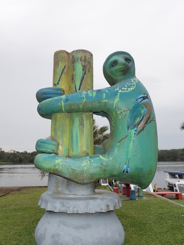 The trash cans in Tortuguero are festooned with colorful artwork above the cans.  This one is of a sloth.